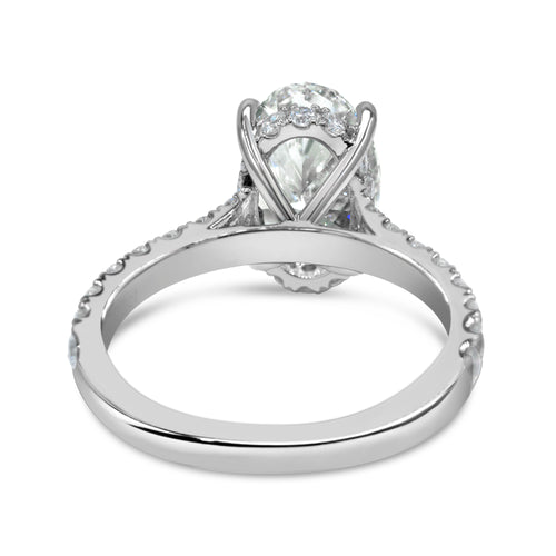 Silver ring with a diamond on a white background